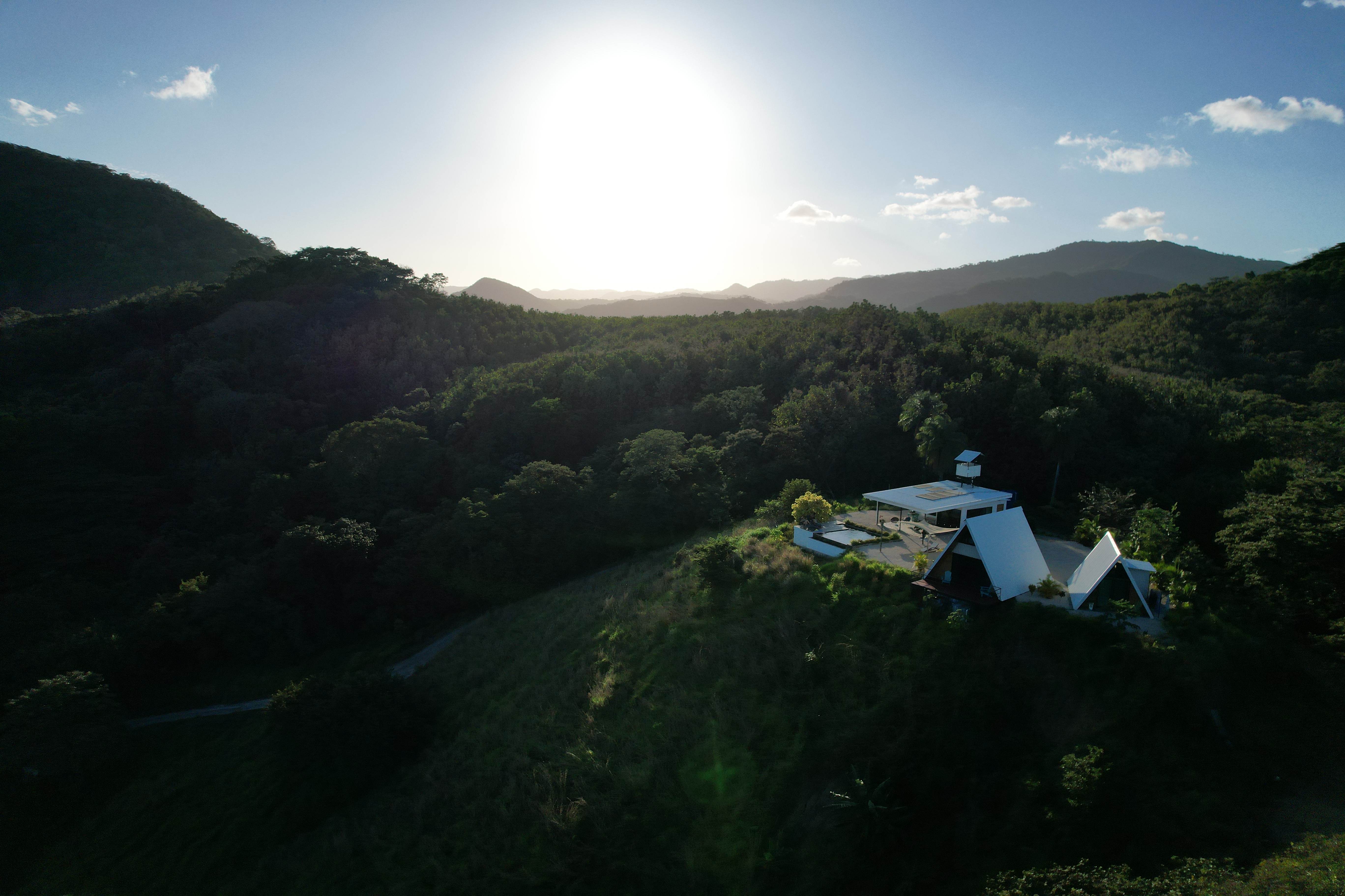 Bright daylight luxury vacation rental Bluesky Lodge mountainous landscape Costa Rica Blue Zone retreat
